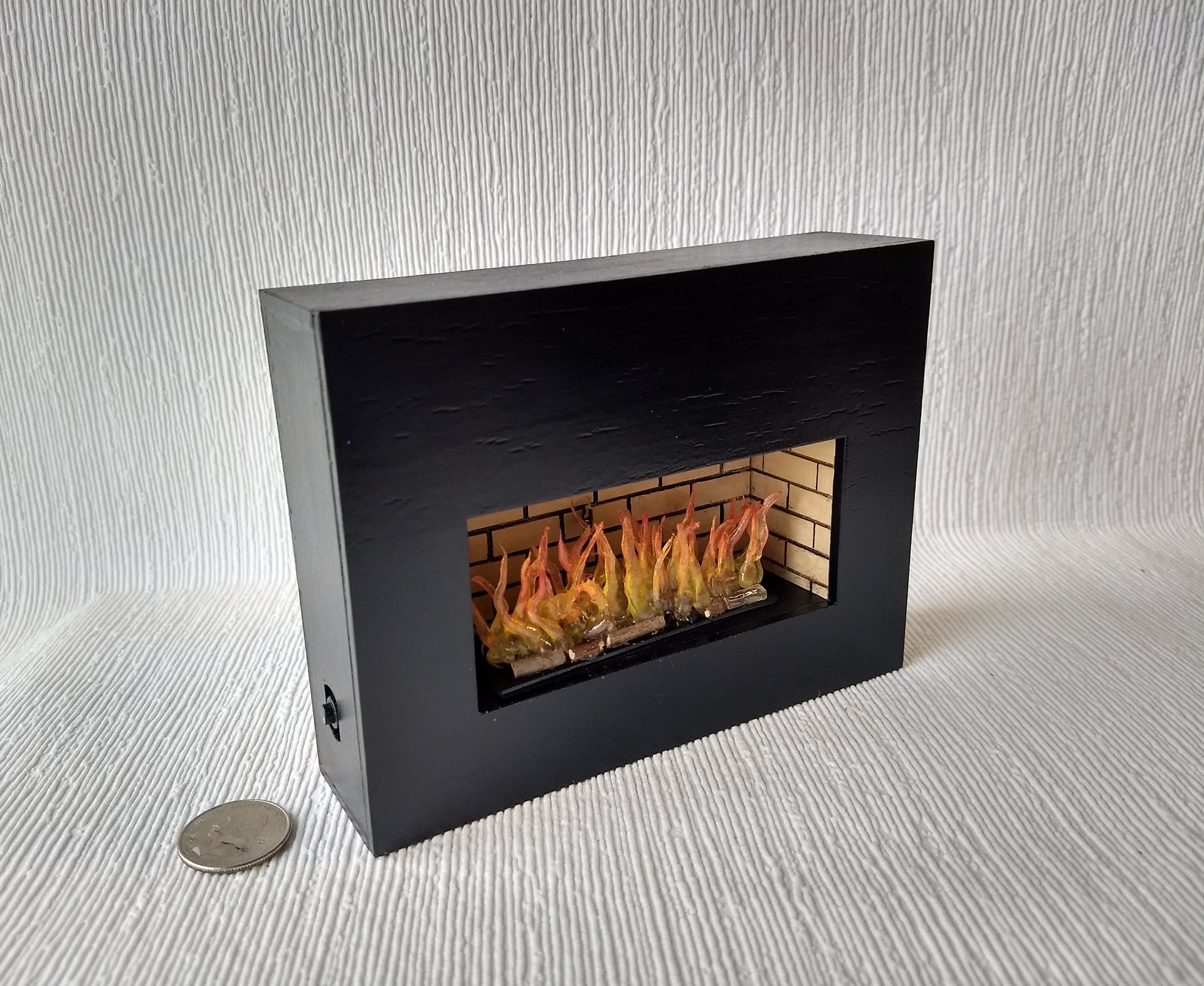 RESERVED 1:12 Dollhouse modern fireplace Free standing black fireplace battery operated with flickering insert that is removable comes with two AAA batteries