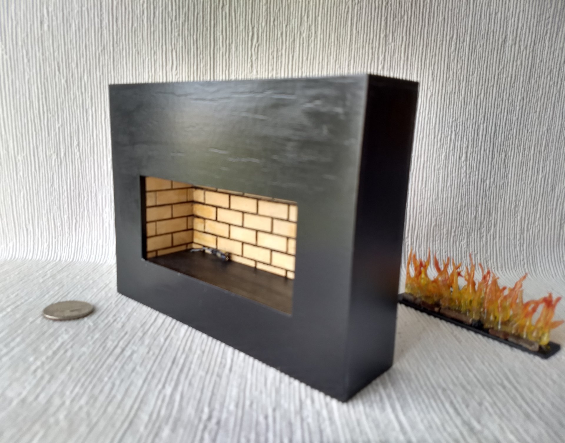 RESERVED 1:12 Dollhouse modern fireplace Free standing black fireplace battery operated with flickering insert that is removable comes with two AAA batteries