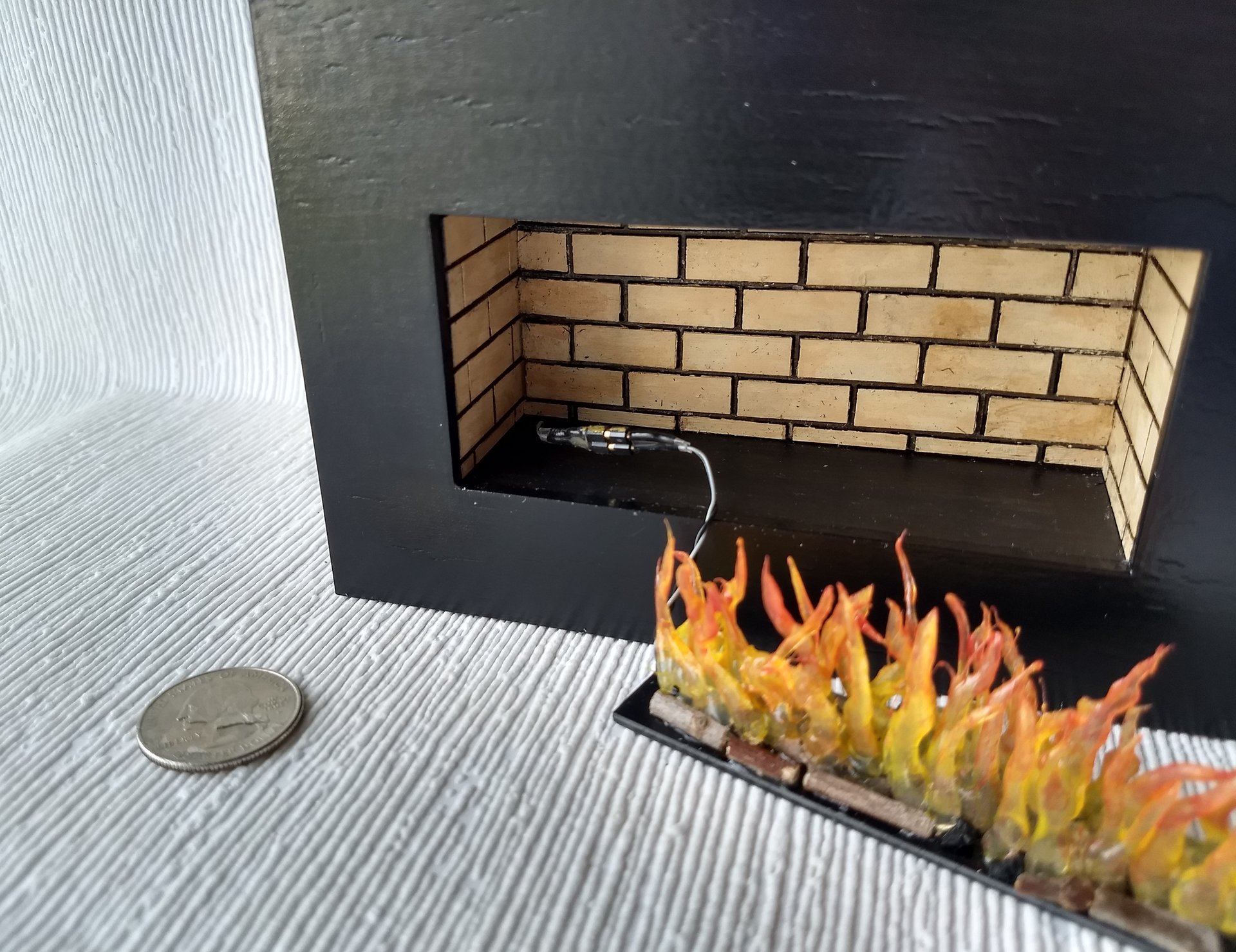 RESERVED 1:12 Dollhouse modern fireplace Free standing black fireplace battery operated with flickering insert that is removable comes with two AAA batteries