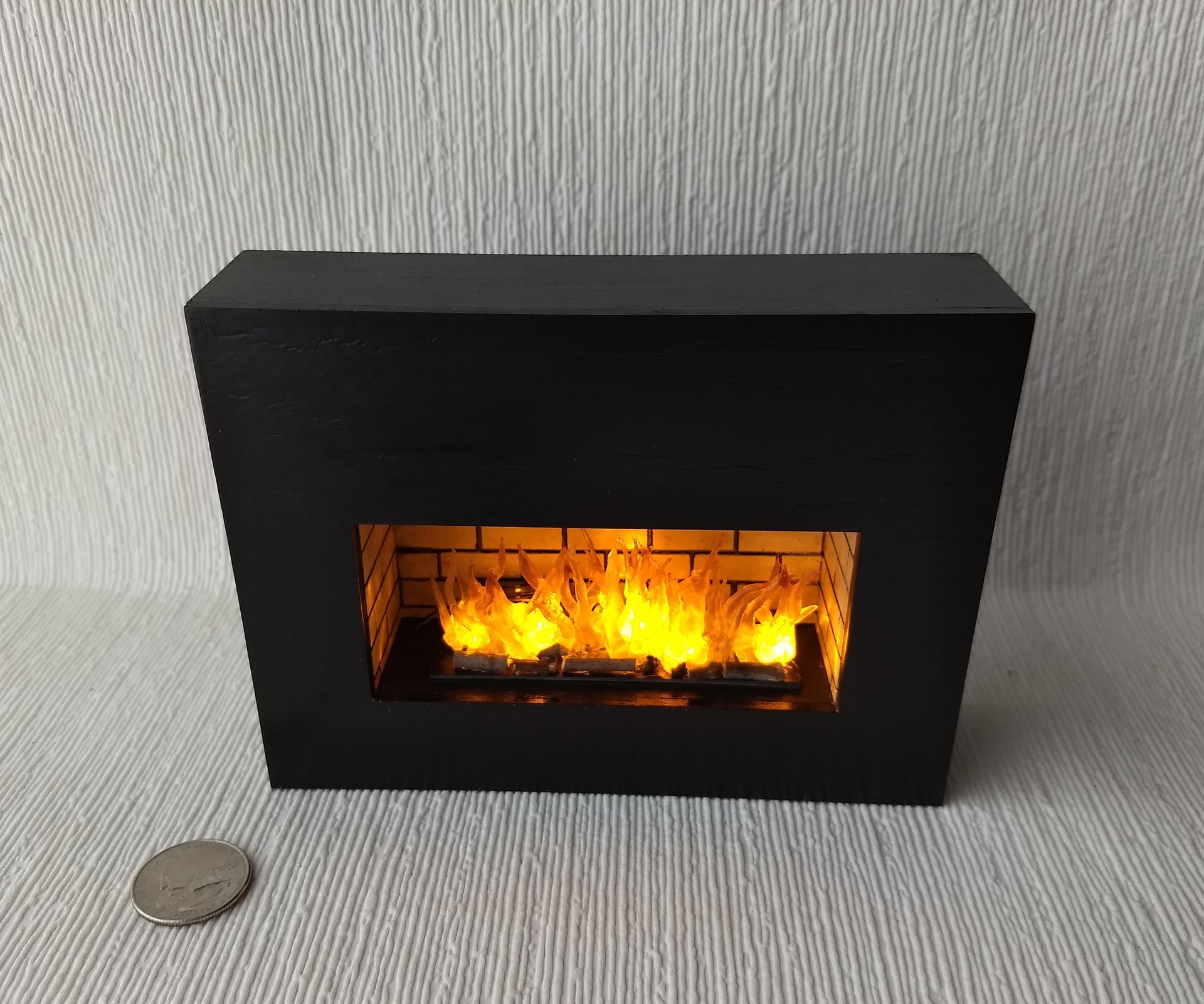 RESERVED 1:12 Dollhouse modern fireplace Free standing black fireplace battery operated with flickering insert that is removable comes with two AAA batteries