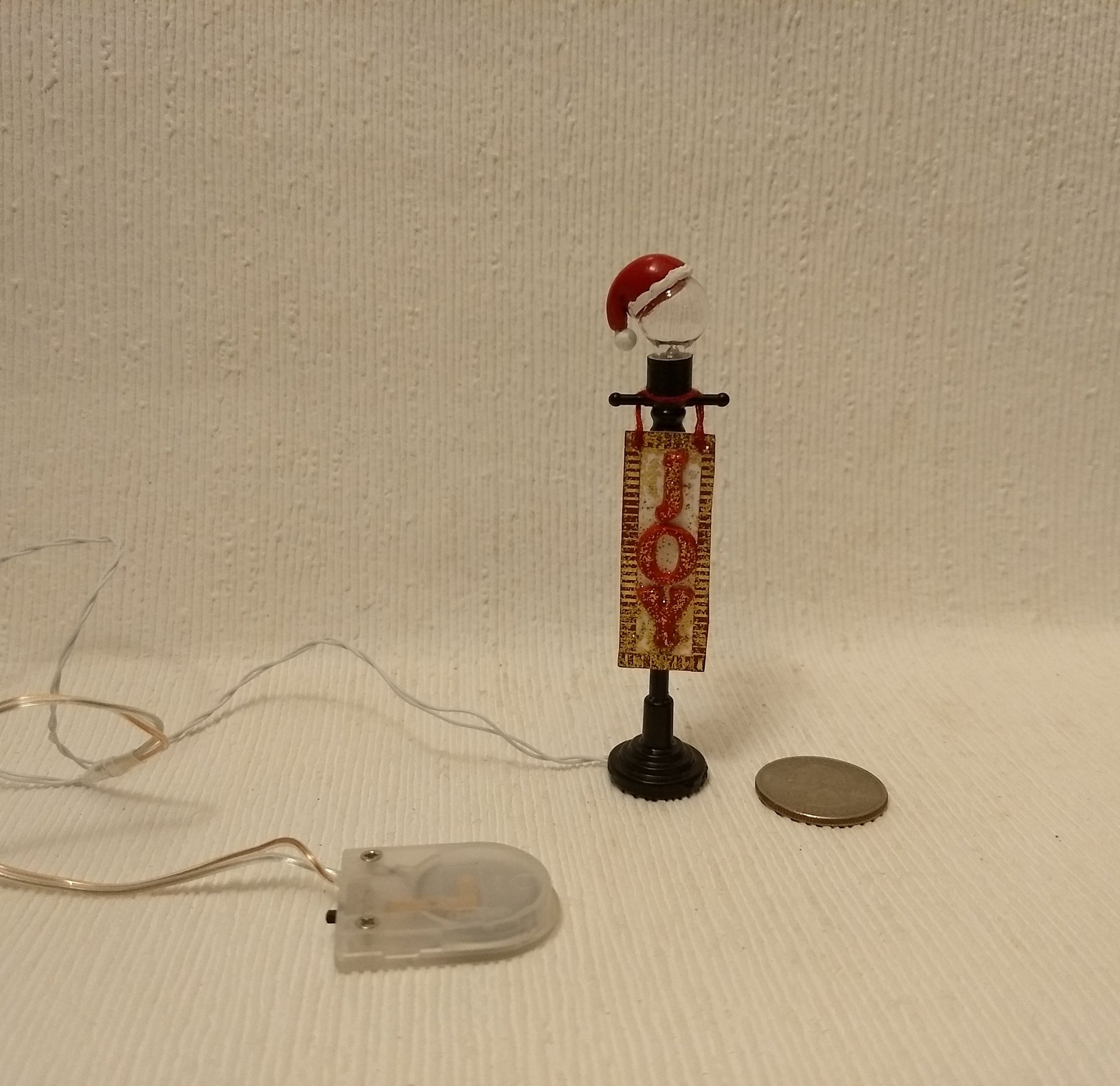 1:12 Dollhouse miniature lawn light JOY sign with Santa hat on lighted glass globe Holiday decor with external wires