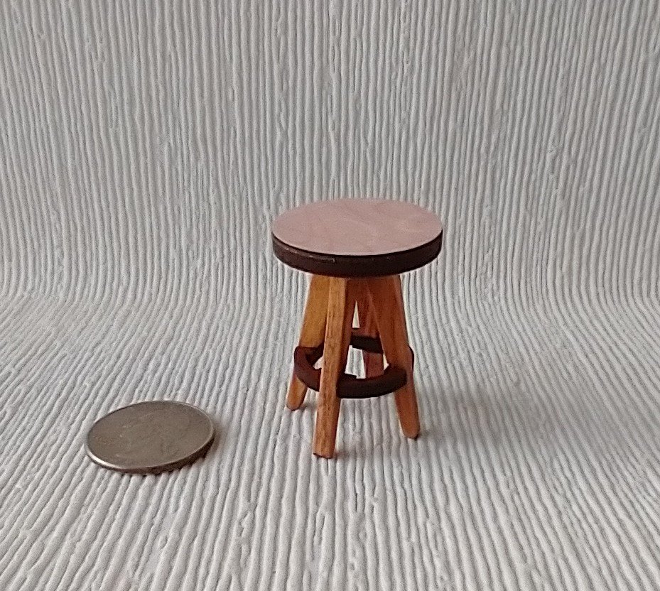 1:12 Dollhouse bath stool with pink laminate seat and solid cherry legs
