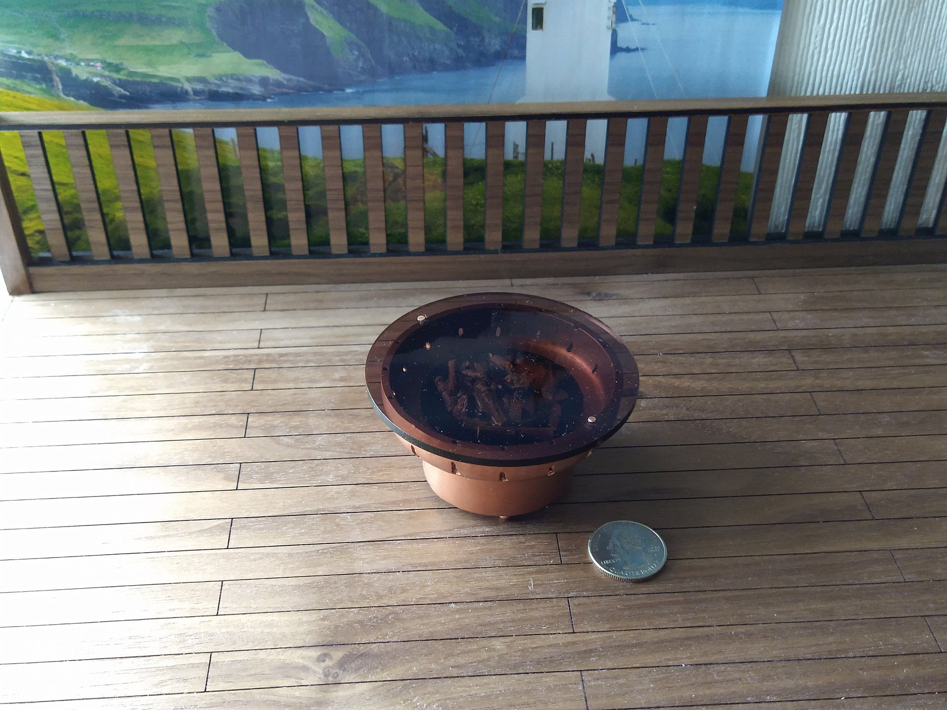 1:12 Dollhouse miniature fire pit Battery operated firepit in copper tone with flickering embers and wood sticks Dual function firepit/ patio coffee table