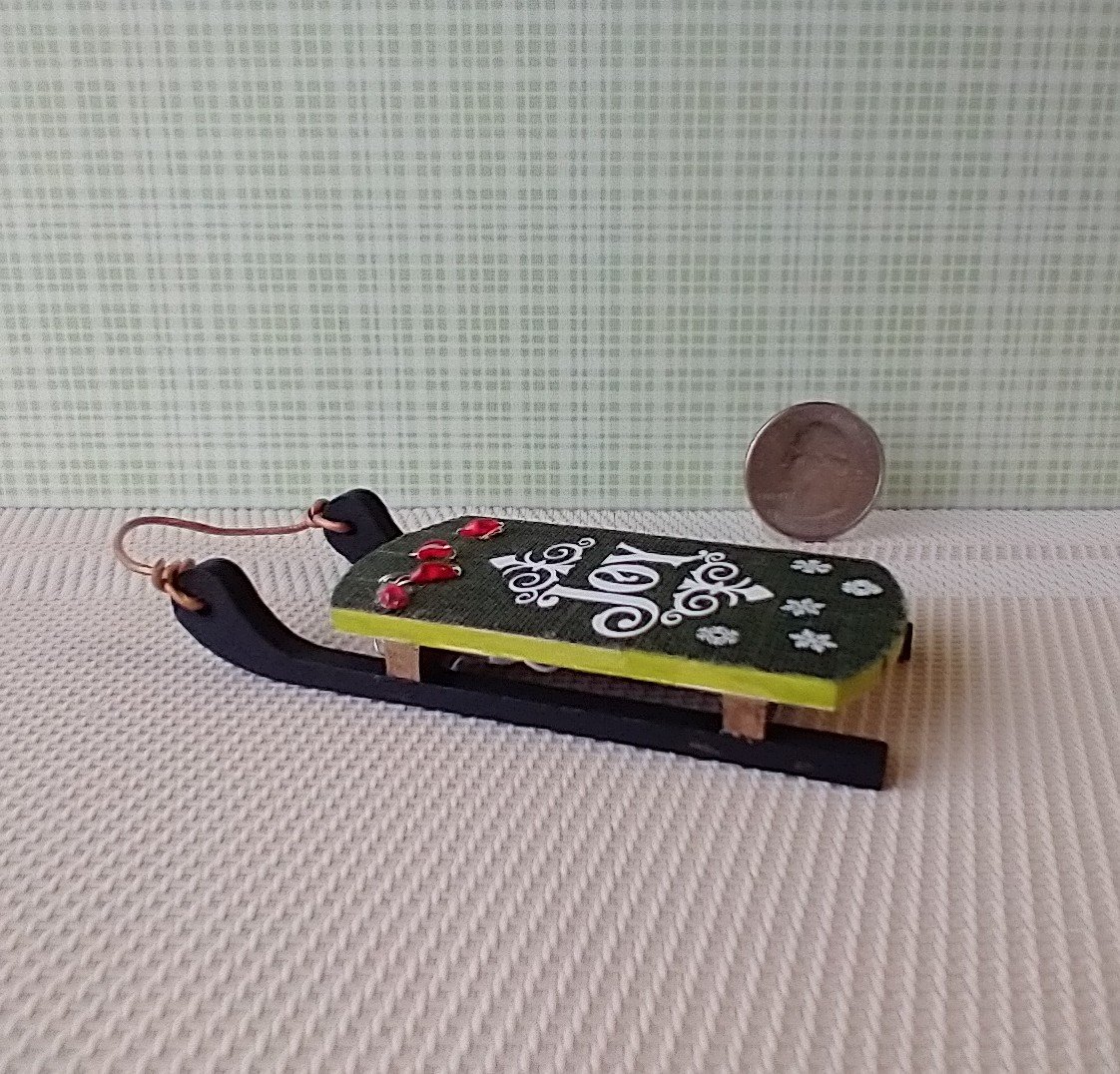 1:12 scale dollhouse light up wooden sled Joy sign decor Battery operated holiday light on green sled REF Lighted JOY on green