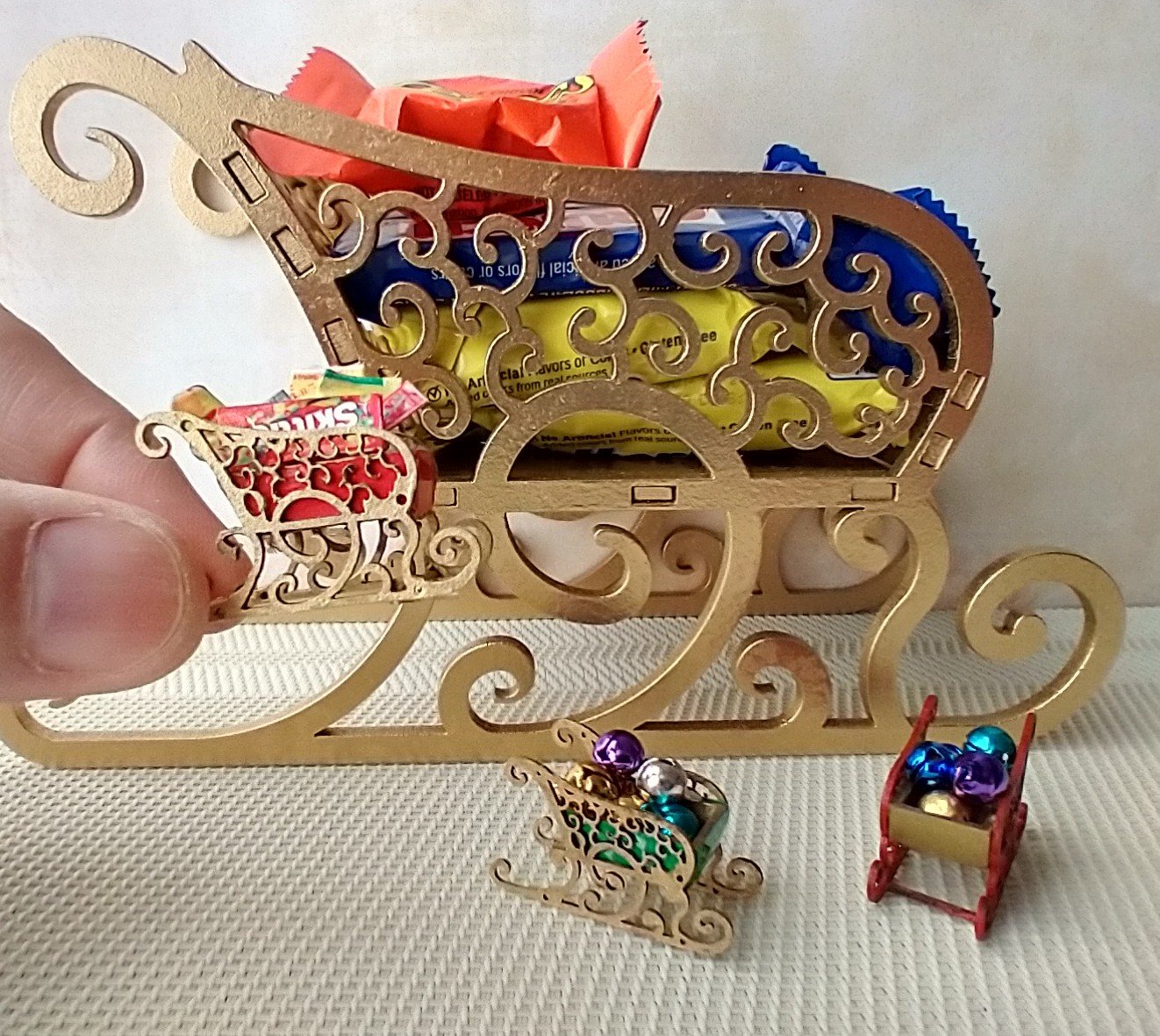 1:12 Dollhouse red holiday sleigh loaded with colorful metal jingle bells REF Golden pod
