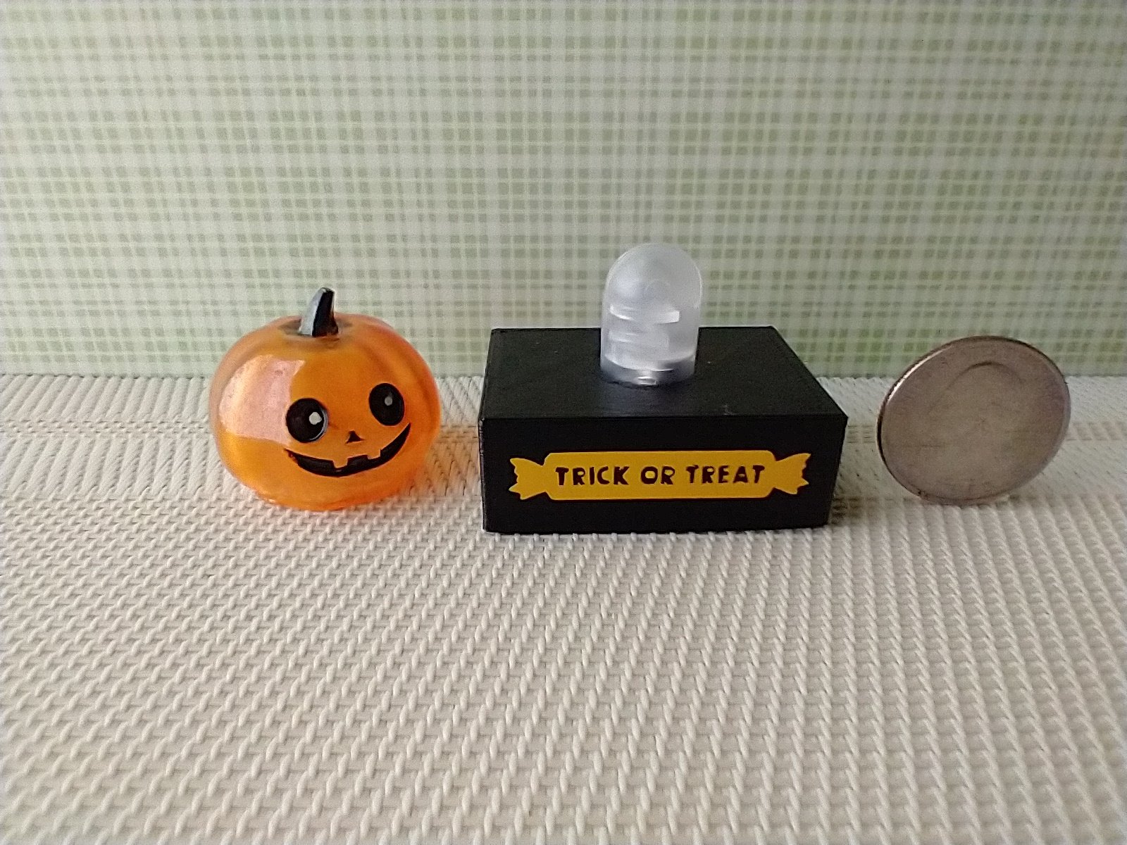 Battery lighted miniature faux glass Jack-o-Lantern Pumpkin light on black stand Halloween light for 1-inch scale or play scale