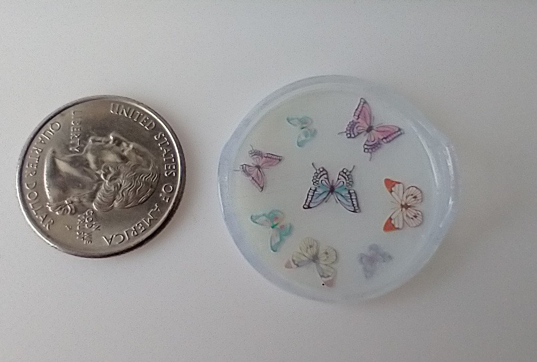1:12 scale round serving tray faux acrylic tray with butterflies on white background