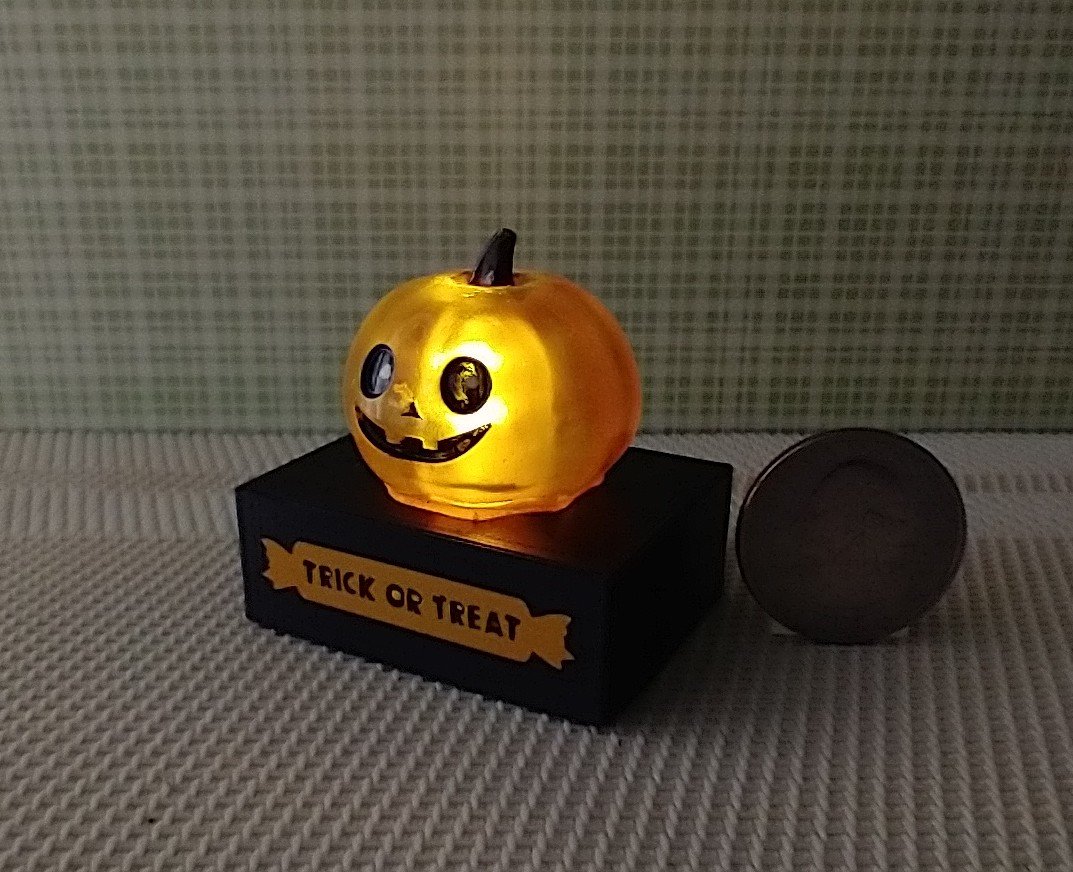 Battery lighted miniature faux glass Jack-o-Lantern Pumpkin light on black stand Halloween light for 1-inch scale or play scale