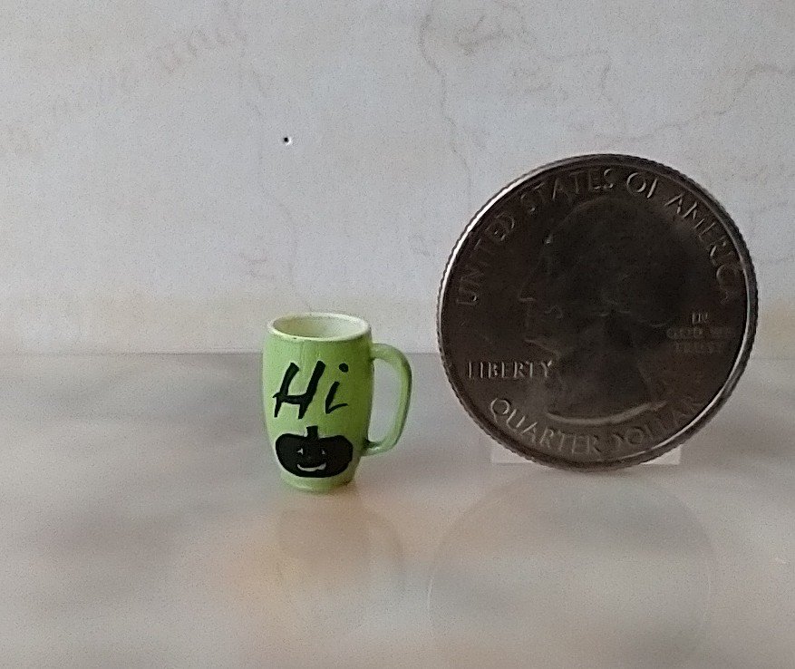 1:12 Dollhouse miniature green mug with Jack O lantern face and "Hi" pumpkin Halloween mug PRICE is for ONE REF Green Hi