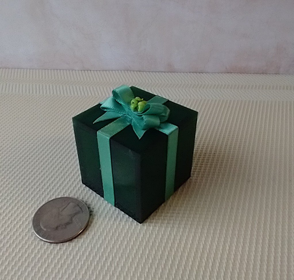 Miniature light up gift box in green with a light green gift bow Battery lighted festive gift box for mini holiday scene display REF Green