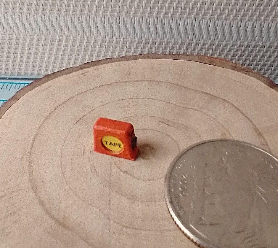 1:12 Dollhouse miniature tape measure for mini DIYer or garage workshop REF Orange