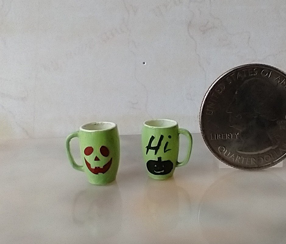 1:12 Dollhouse miniature green mug with Jack O lantern face and "Hi" pumpkin Halloween mug PRICE is for ONE REF Green Hi