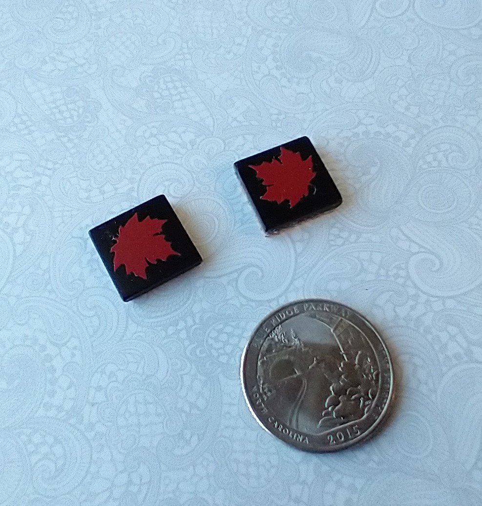 1:12 Dollhouse kitchen accessory Faux black ceramic trivet with maple leaf decal cork backing PRICE is for EACH Reference red leaf