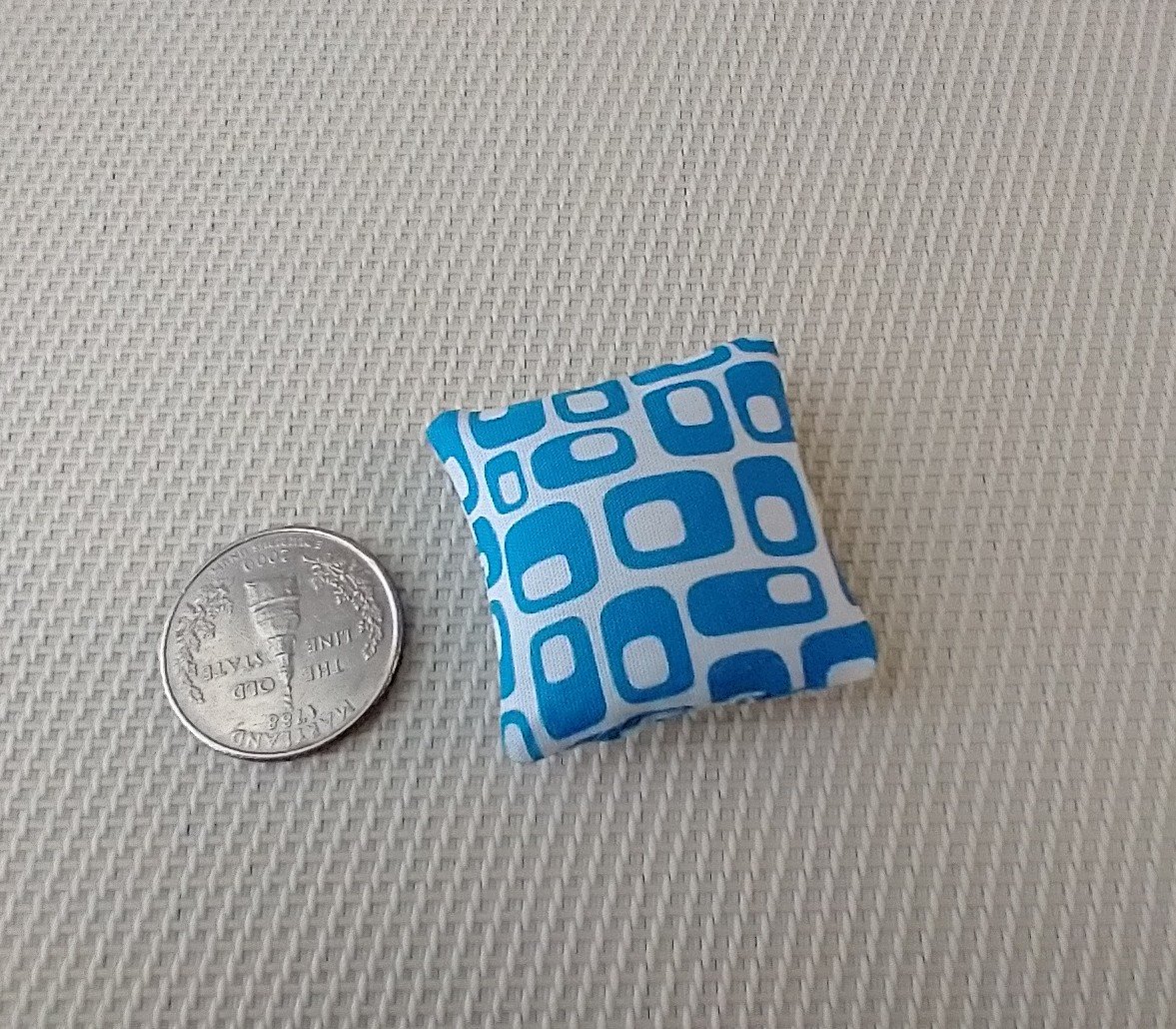 1:12 dollhouse MCM themed sofa cushion with white background and blue geometric shapes REF blue geo
