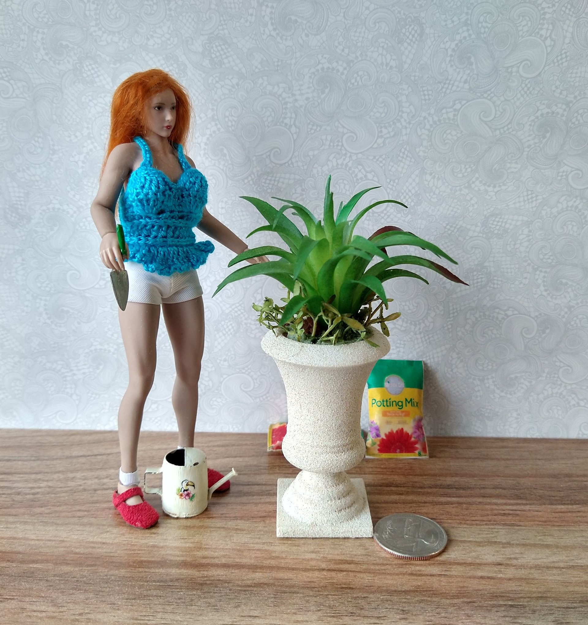 1:12 Dollhouse miniature faux limestone planter with green plant and undergrowth