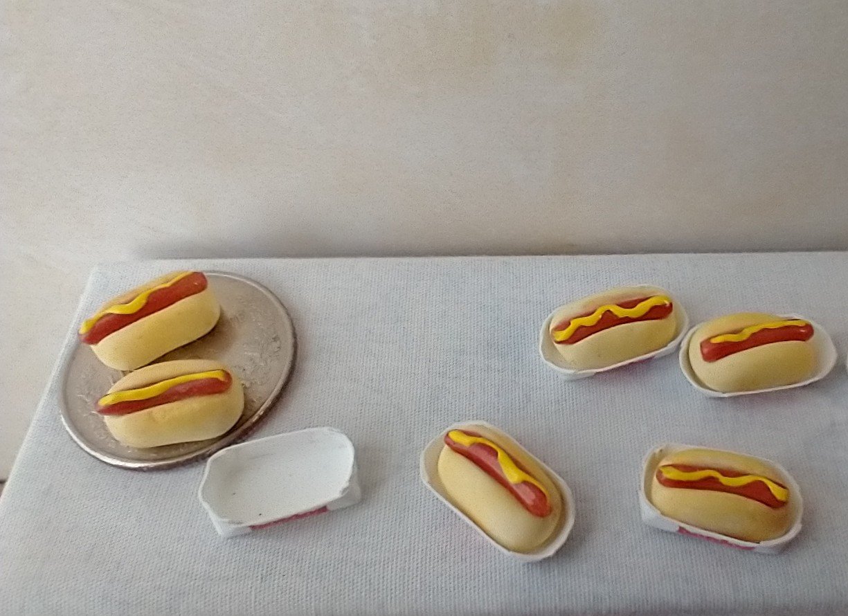 1:12 Dollhouse handcrafted hotdog and bun with mustard in paper plate marked "hotdog" so your mini friend knows what s/he will be eating Price is for ONE unit