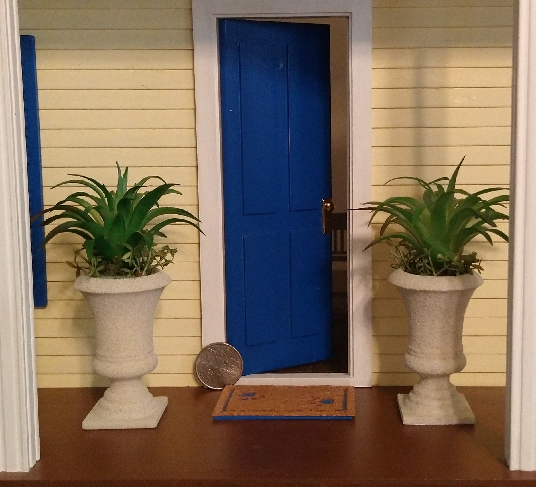 1:12 Dollhouse miniature faux limestone planter with green plant and undergrowth