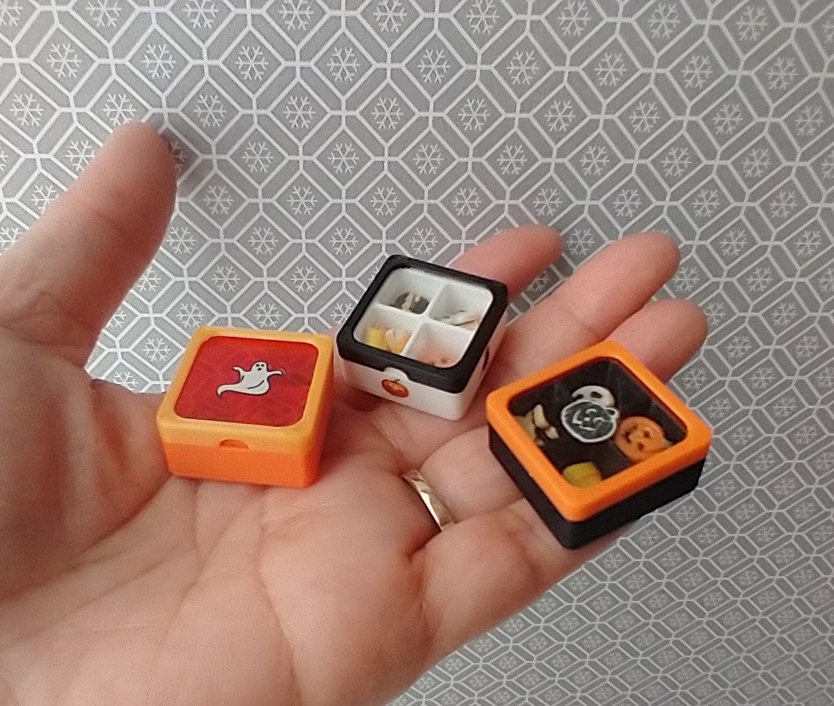 1:12 scale miniature gift boxed Halloween cookies 16 assorted pumpkins skulls candy corn and bats in box with dividers and clear window REF White base