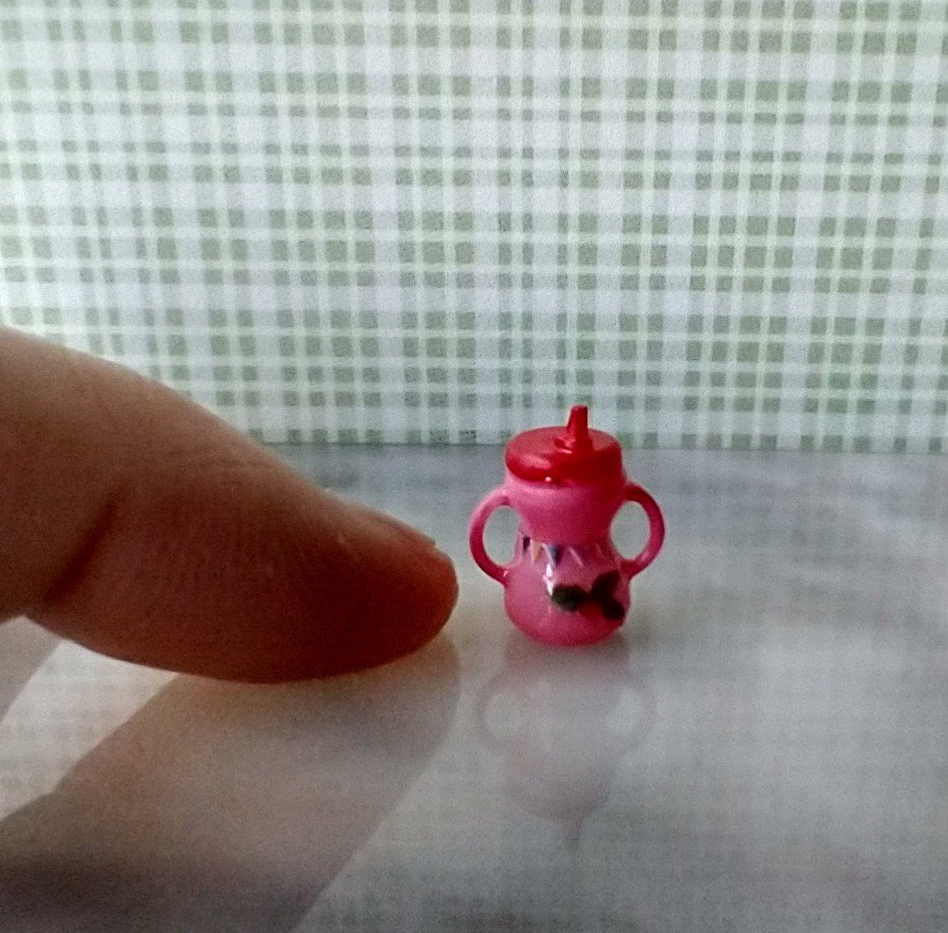 Dollhouse miniature holiday-themed sippy cup with easy grip handles REF Pink body, Christmas ornament, holly