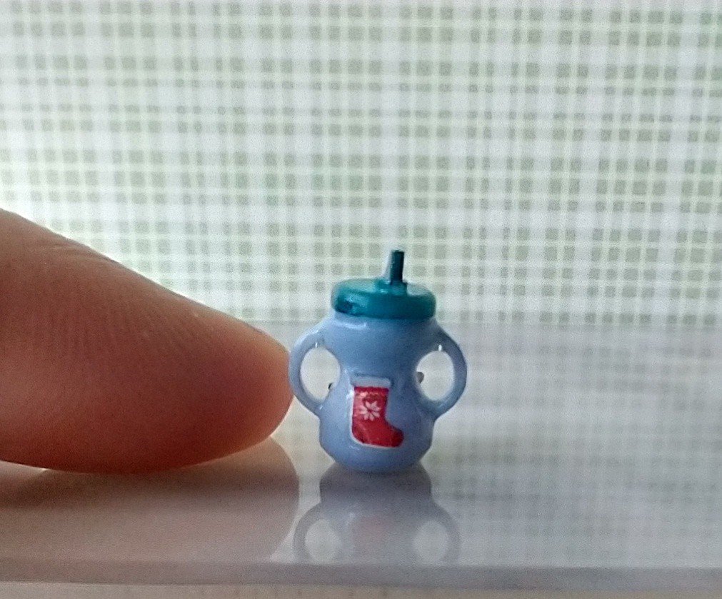 Dollhouse miniature holiday-themed sippy cup with easy grip handles REF Teal lid, poinsettia, stocking