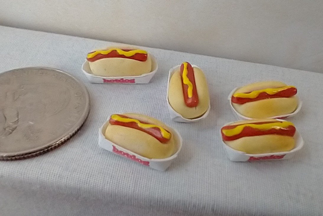 1:12 Dollhouse handcrafted hotdog and bun with mustard in paper plate marked "hotdog" so your mini friend knows what s/he will be eating Price is for ONE unit