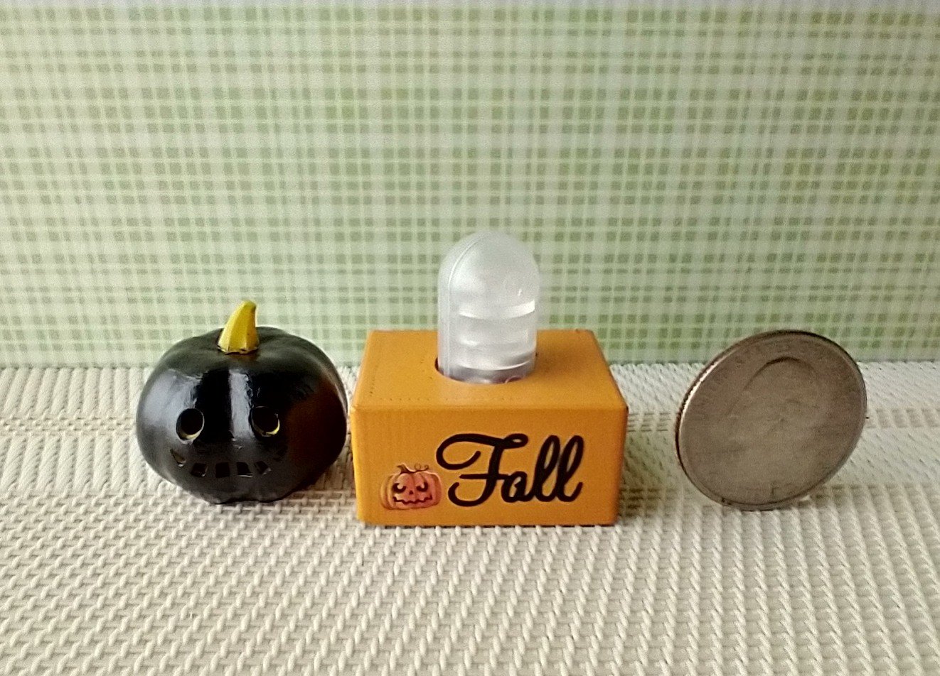 Battery lighted miniature Jack-o-Lantern Pumpkin light on black stand Halloween light for 1-inch scale or play scale REF Black pumpkin