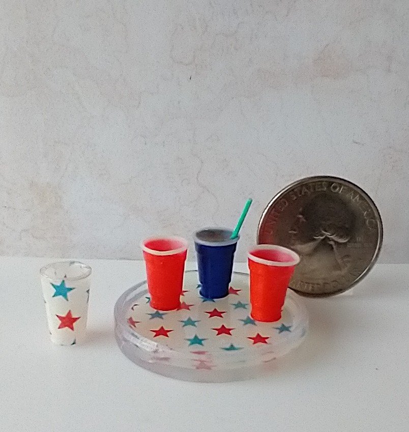 1:12 scale round serving tray faux acrylic tray with red blue stars on white background July 4th party tray REF July 4th