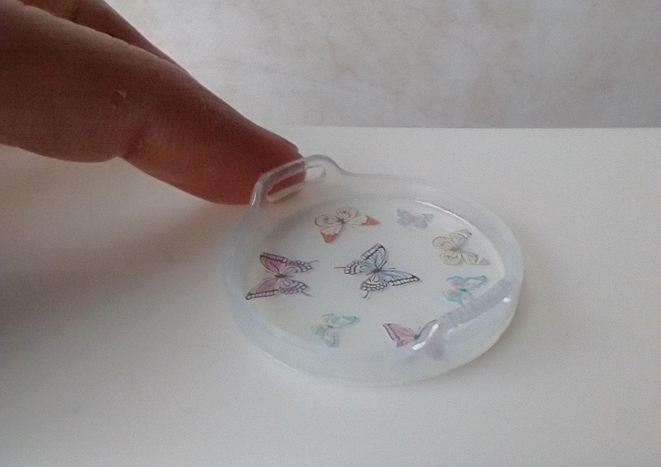 1:12 scale round serving tray faux acrylic tray with butterflies on white background
