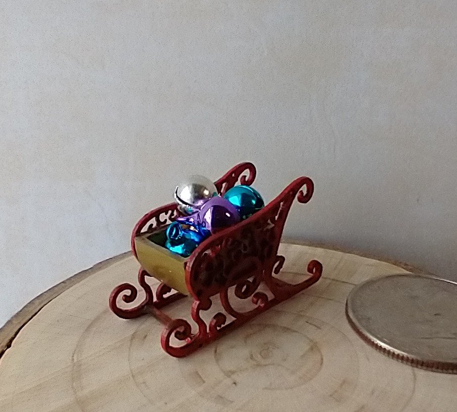 1:12 Dollhouse red holiday sleigh loaded with colorful metal jingle bells REF Golden pod