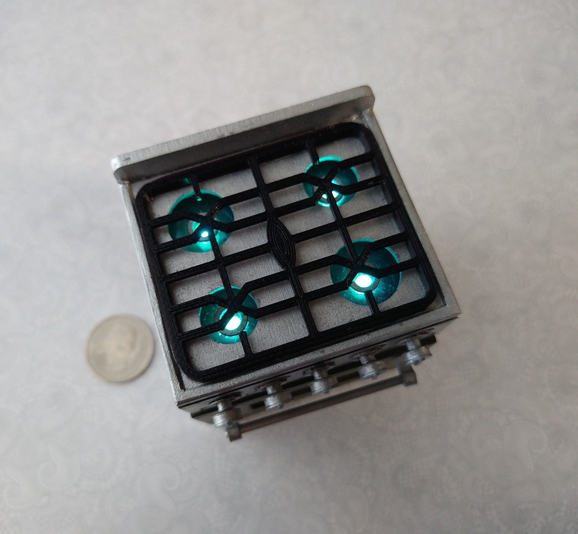 RESERVED 1:12 Dollhouse gas stove with  light up oven and four burners with suggested blue flames Door and faux drawer in green with silvery sides