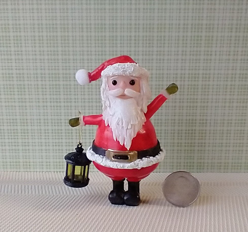 Miniature light up Santa Claus holiday decor Battery operated lighted Santa figurine Christmas display