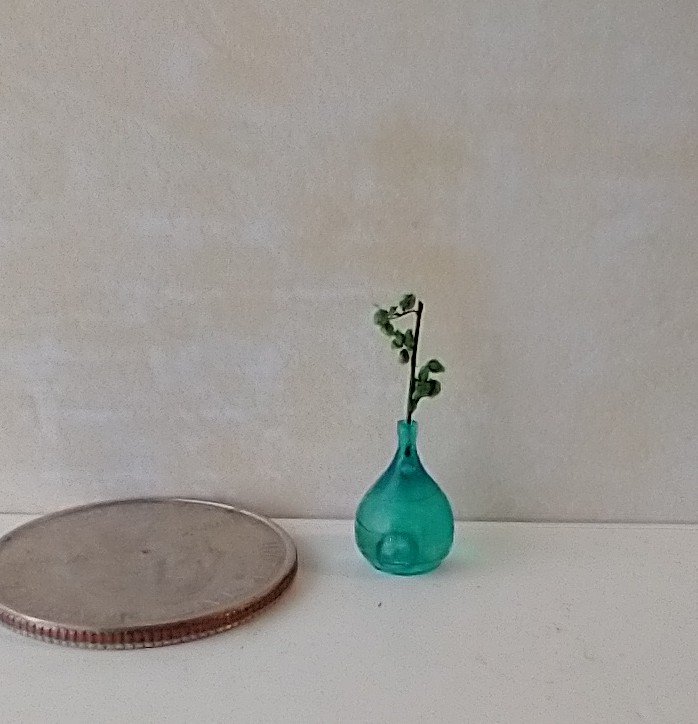 1:12 miniature tear drop shaped flower vase in transparent blue comes with green plant
