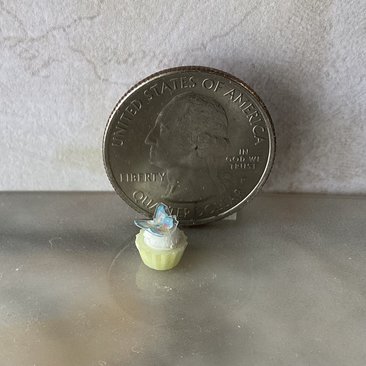 1:12 Dollhouse miniature cupcake with white cream and blue butterfly topper