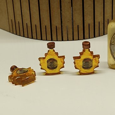 1:12 Dollhouse miniature handcrafted maple syrup in maple leaf shaped bottles Dollhouse fake food Price is for ONE bottle