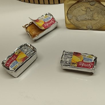 1:12 Dollhouse miniature frozen pound cake with paper lid glued down Price is for ONE cake