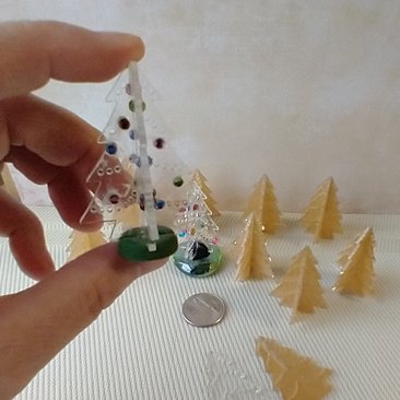 1:12 scale clear acrylic Christmas tree kit - two laser cut tree shapes to be put together to form a 3D tree Price is for EACH set Embellishments not included