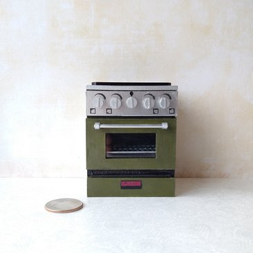 RESERVED 1:12 Dollhouse gas stove with  light up oven and four burners with suggested blue flames Door and faux drawer in green with silvery sides