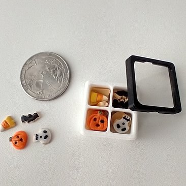 1:12 scale miniature gift boxed Halloween cookies 16 assorted pumpkins skulls candy corn and bats in box with dividers and clear window REF White base