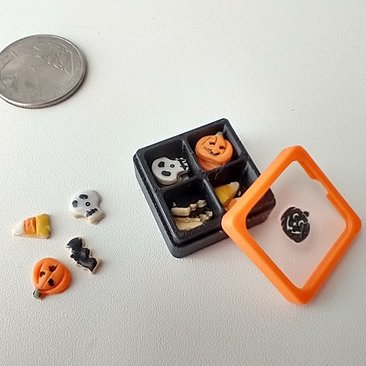 1:12 scale miniature gift boxed Halloween cookies 16 assorted pumpkins skulls candy corn and bats in box with dividers and clear window REF Black base
