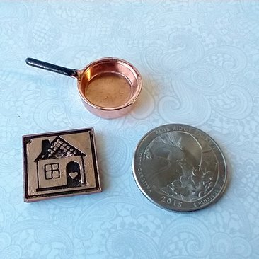 1:12 Dollhouse kitchen accessory Faux opper trivet with house image relief