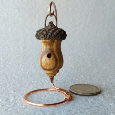 Miniature lathe turned zebrawood bird house with acorn cap on copper wire stand